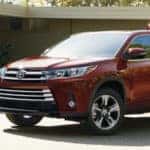 Red 2019 Toyota Higlander parked in driveway