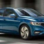 The 2019 VW Jetta driving down a road
