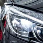 close up of a person waxing their car