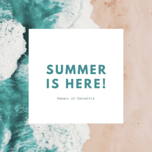 "summer is here! Subaru of Albany" is written on a white square with an image of the beach behind it.