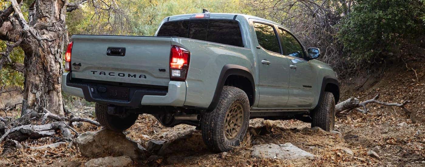 Grey 2022 Toyota Tacoma SR5 driving off-road