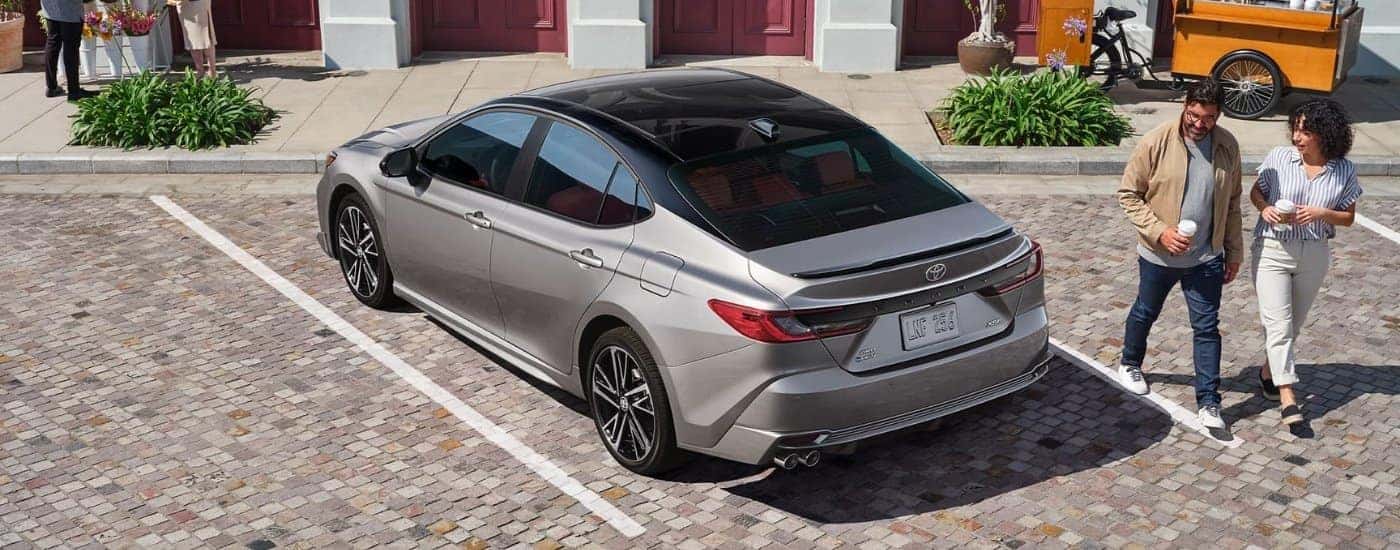Silver 2025 Toyota Camry XSE parked in a space