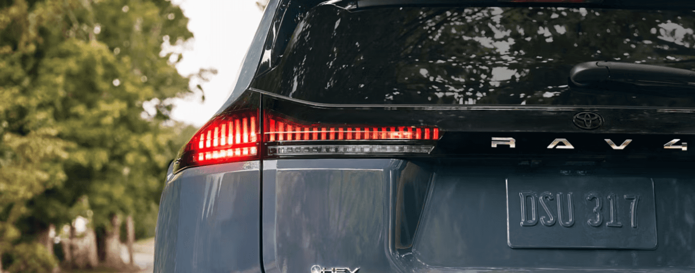 Rear badging on a blue 2026 Toyota RAV4