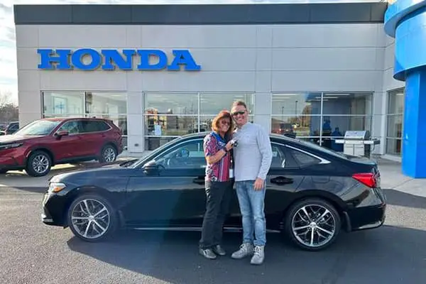 Victory Honda of Muncie customers with new vehicles