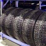Stack of car tires on warehouse closeup