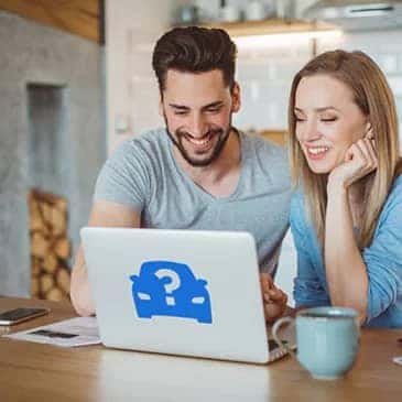 Couple Searching for Car Online