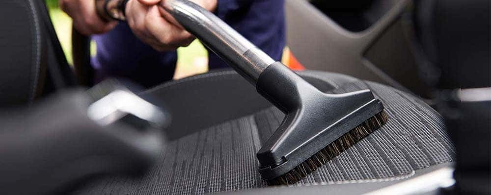 Vacuuming debris in car
